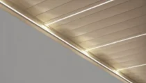 Close-up of louvered pergola underside with closed louvres and built-in LED lighting